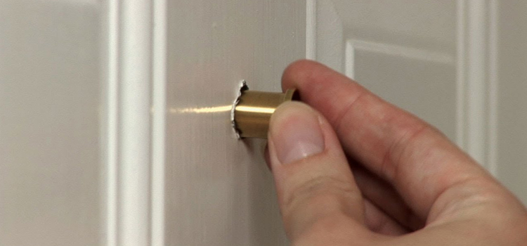 peephole door repair in Palm City